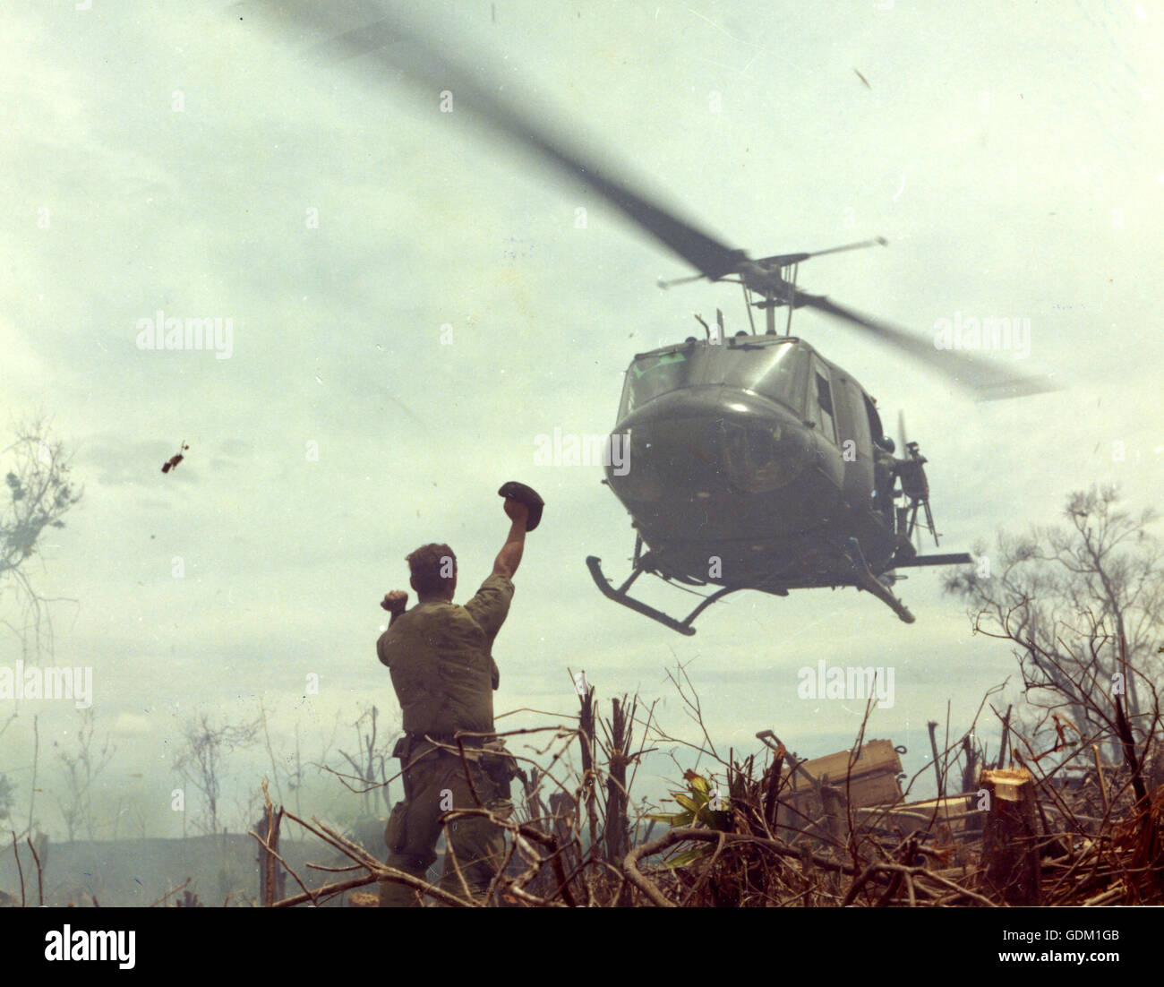 Operation Jeb Stuart III, south of Quang Tri. Soldier guiding a Huey helicopter into landing. 1968. Stock Photo