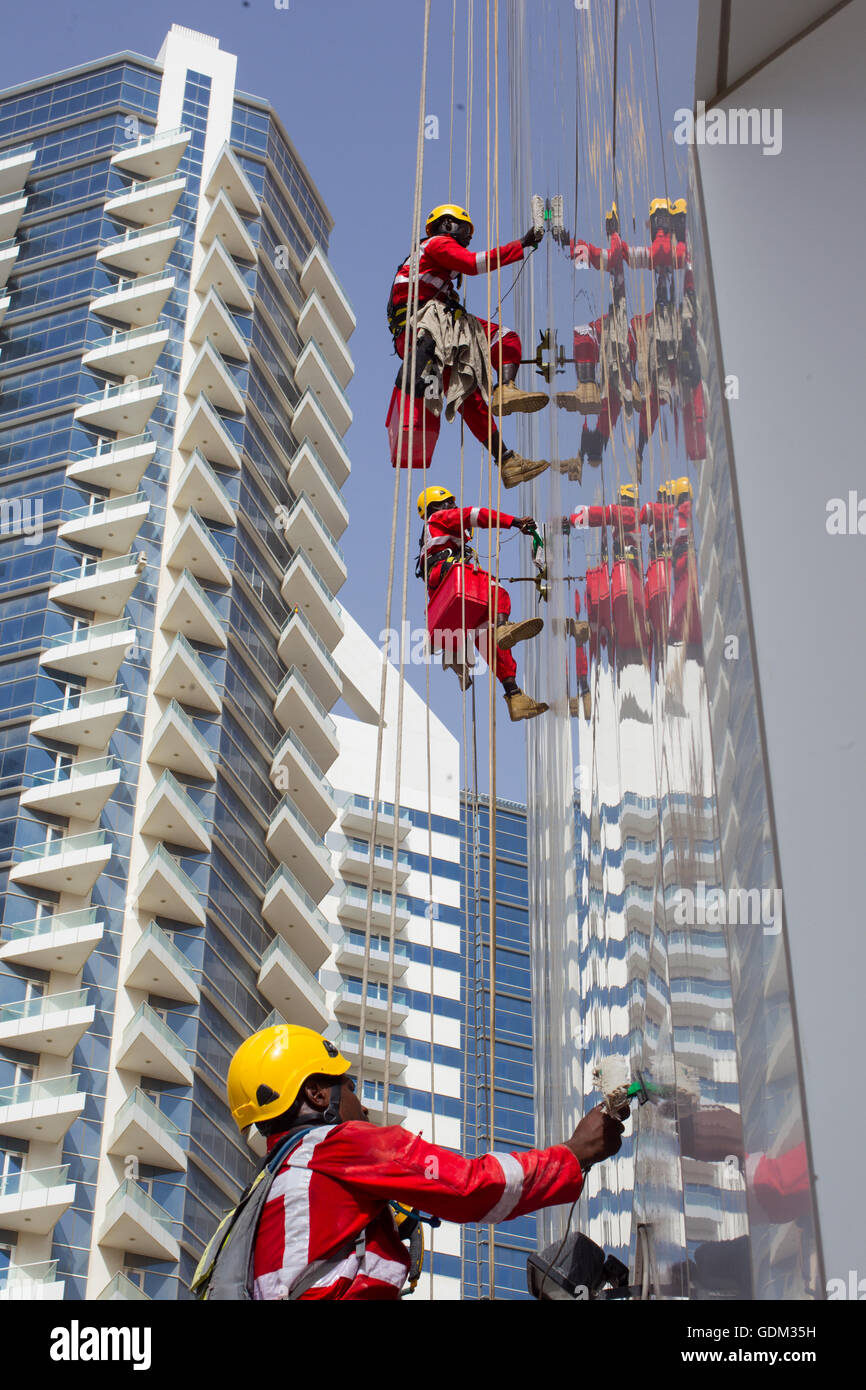 Cleaners of the towers, Dubai, UAE Stock Photo Alamy