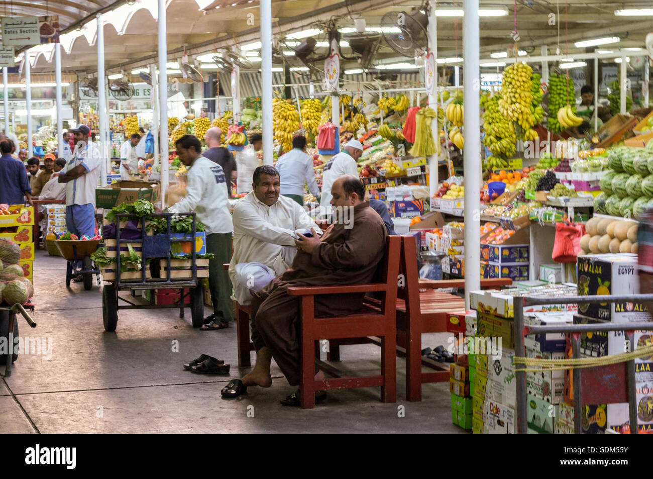 Busy scene at the fruit and vegetable market in Dubai, UAE Stock Photo
