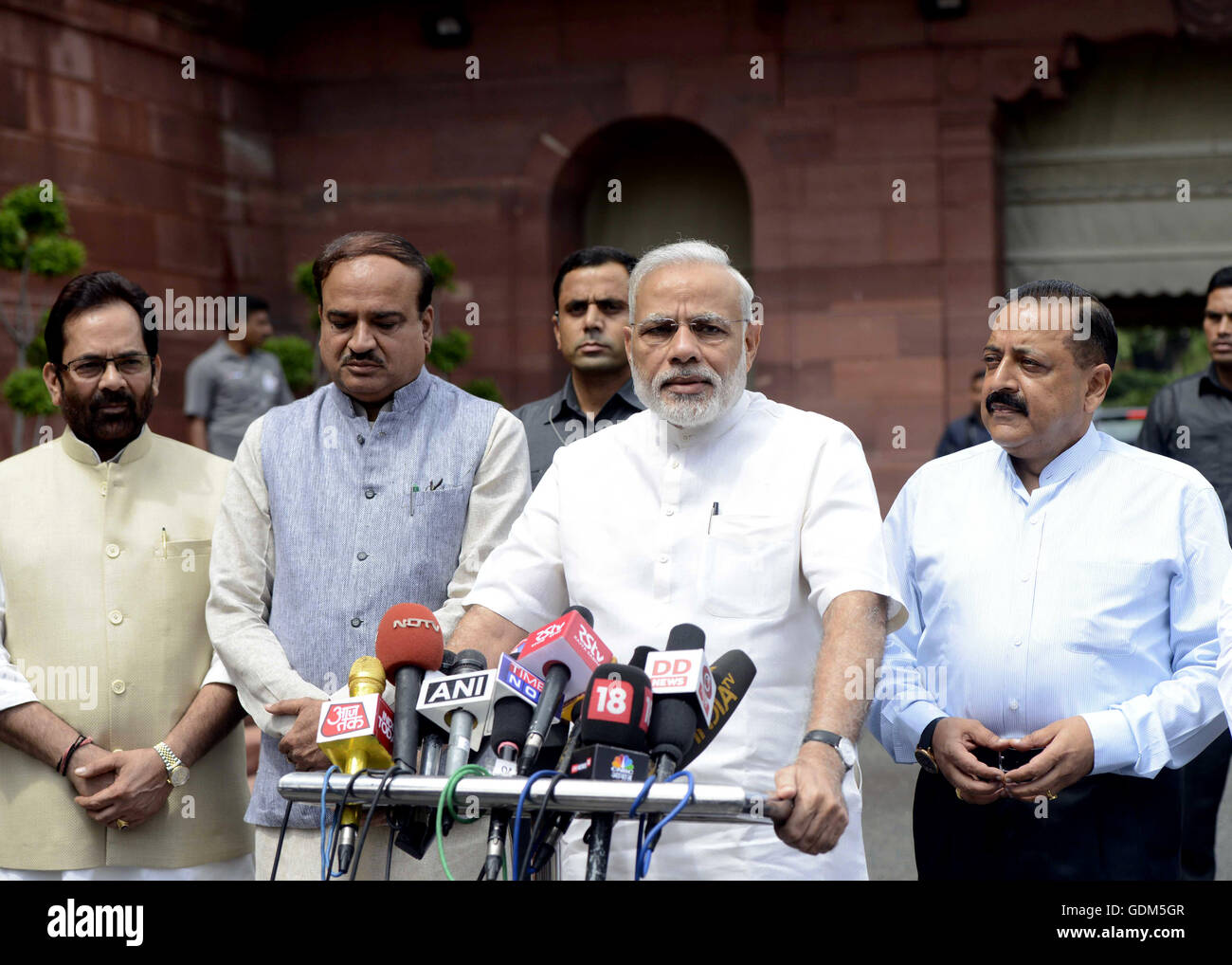 (160718) -- NEW DELHI, July 18, 2016 (Xinhua) -- Indian Prime Minister Narendra Modi (2nd R, front) addresses the media at Parliament House upon arrival on the first day of monsoon session in New Delhi, India, July 18, 2016. The monsoon session of Indian lower house began on Monday but was adjourned shortly toTuesday due to the death of Madhya Pradesh MP Dalpat Singh Paraste. (Xinhua/Stringer) (sxk) Stock Photo