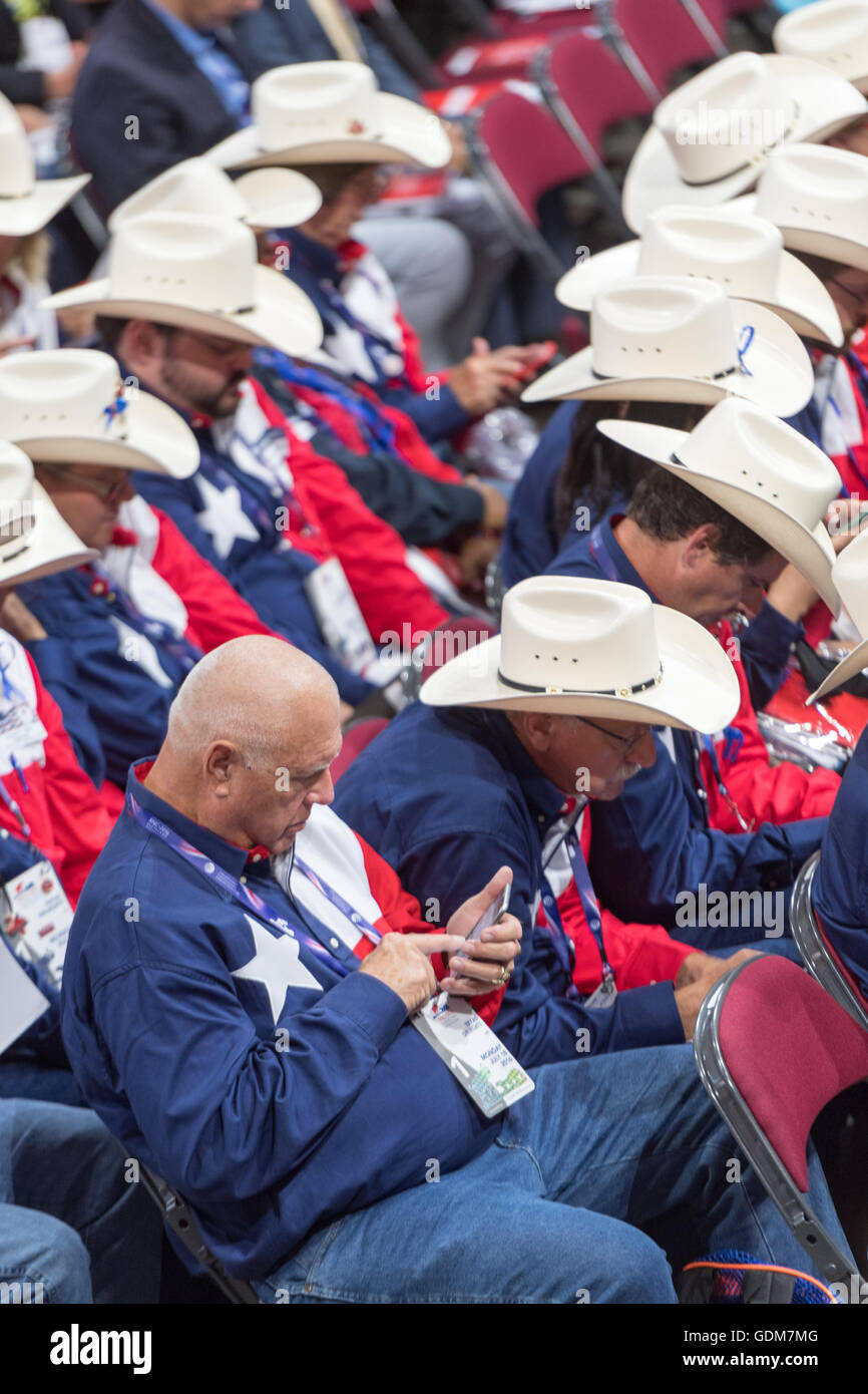 Cleveland, Ohio, USA. 18th July, 2016. Texas republican delegates wearing cowboy hats during the first day of the Republican National Convention at the Quicken Loans Center July 18, 2016 in Cleveland, Ohio. Credit:  Planetpix/Alamy Live News Stock Photo