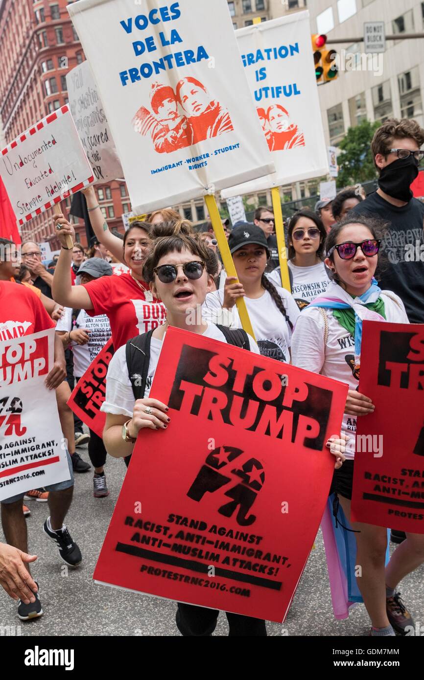 Cleveland, Ohio, USA. 18th July, 2016. Anti-Trump protesters march through downtown near the Republican National Convention at the Quicken Loans Center July 18, 2016 in Cleveland, Ohio. Credit:  Planetpix/Alamy Live News Stock Photo