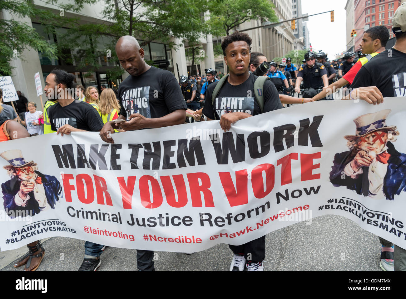 Cleveland, Ohio, USA. 18th July, 2016. Anti-Trump protesters march through downtown near the Republican National Convention at the Quicken Loans Center July 18, 2016 in Cleveland, Ohio. Credit:  Planetpix/Alamy Live News Stock Photo