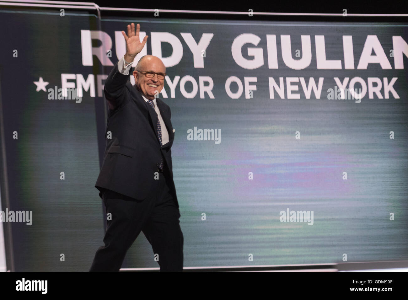 Cleveland, Ohio, USA. 18th July, 2016. Former New York Mayor Rudy Giuliani wavs as he walks on stage to speak during the first day of the Republican National Convention at the Quicken Loans Center July 18, 2016 in Cleveland, Ohio. Credit:  Planetpix/Alamy Live News Stock Photo