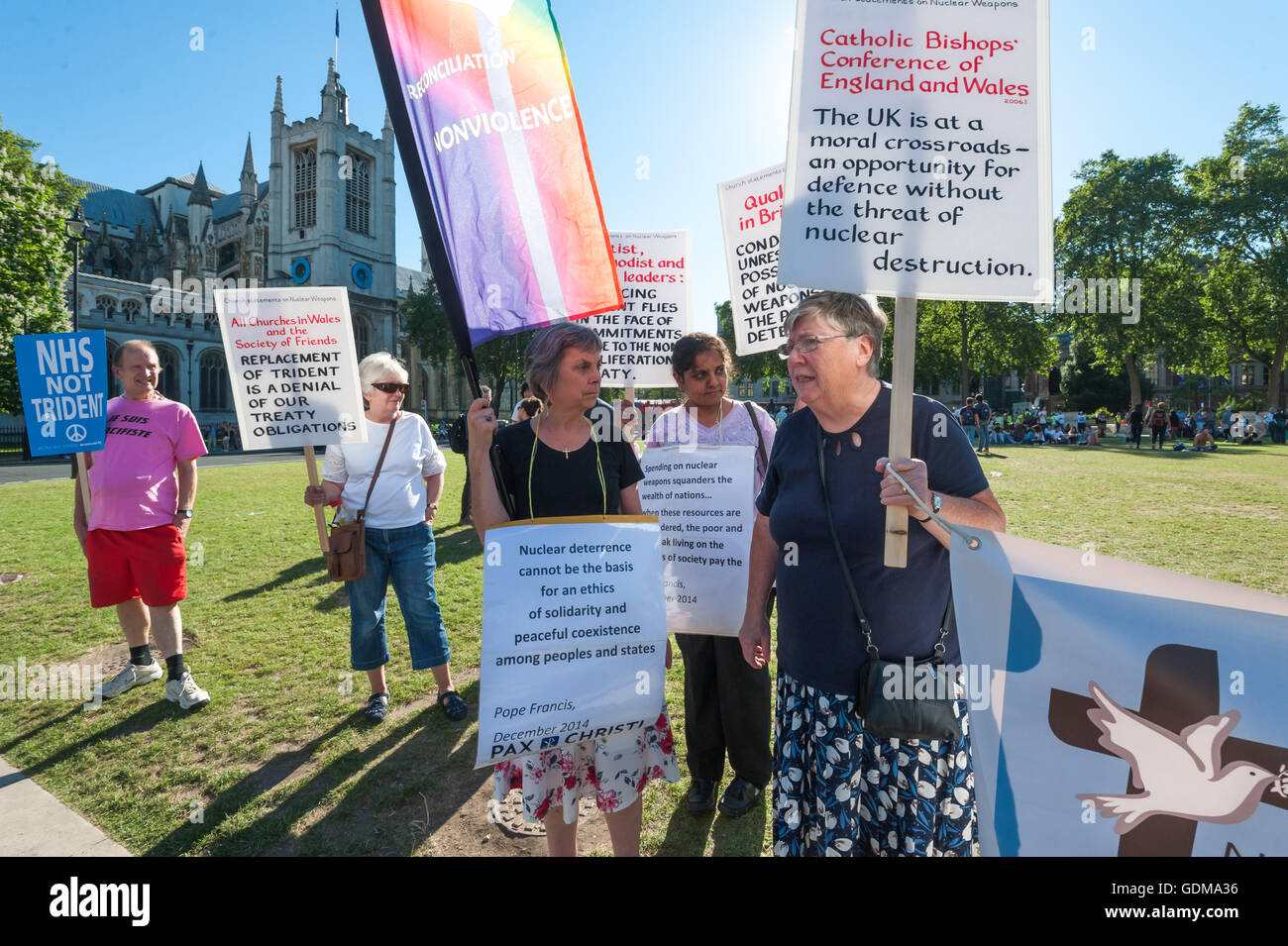 London, UK. 18th July 2016. As Parliament debated giving the go-ahead to the replacement for the UK's Trident nuclear submarines, a crowd protested on Parliament Square at a rally organised by CND. Speakers included MPs and other politicians, peace campaigners and others who stressed that the independence of Trident and the idea of deterrence were myths and the use of nuclear weapons was illegal and immoral. Credit:  Peter Marshall/Alamy Live News Stock Photo