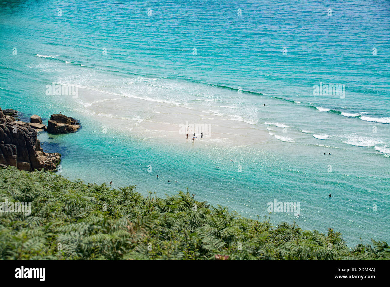 Treen, Cornwall, UK. 19th July 2016. UK Weather. People take to the sea in Cornwall to keep cool in the Heatwave. Credit:  cwallpix/Alamy Live News Stock Photo