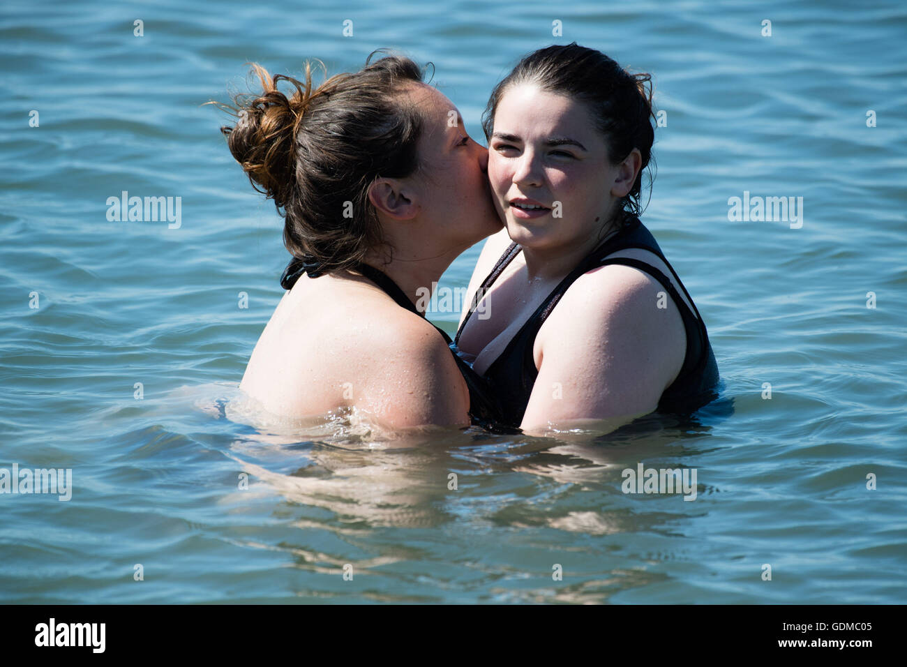 Three Hot Girls Kissing