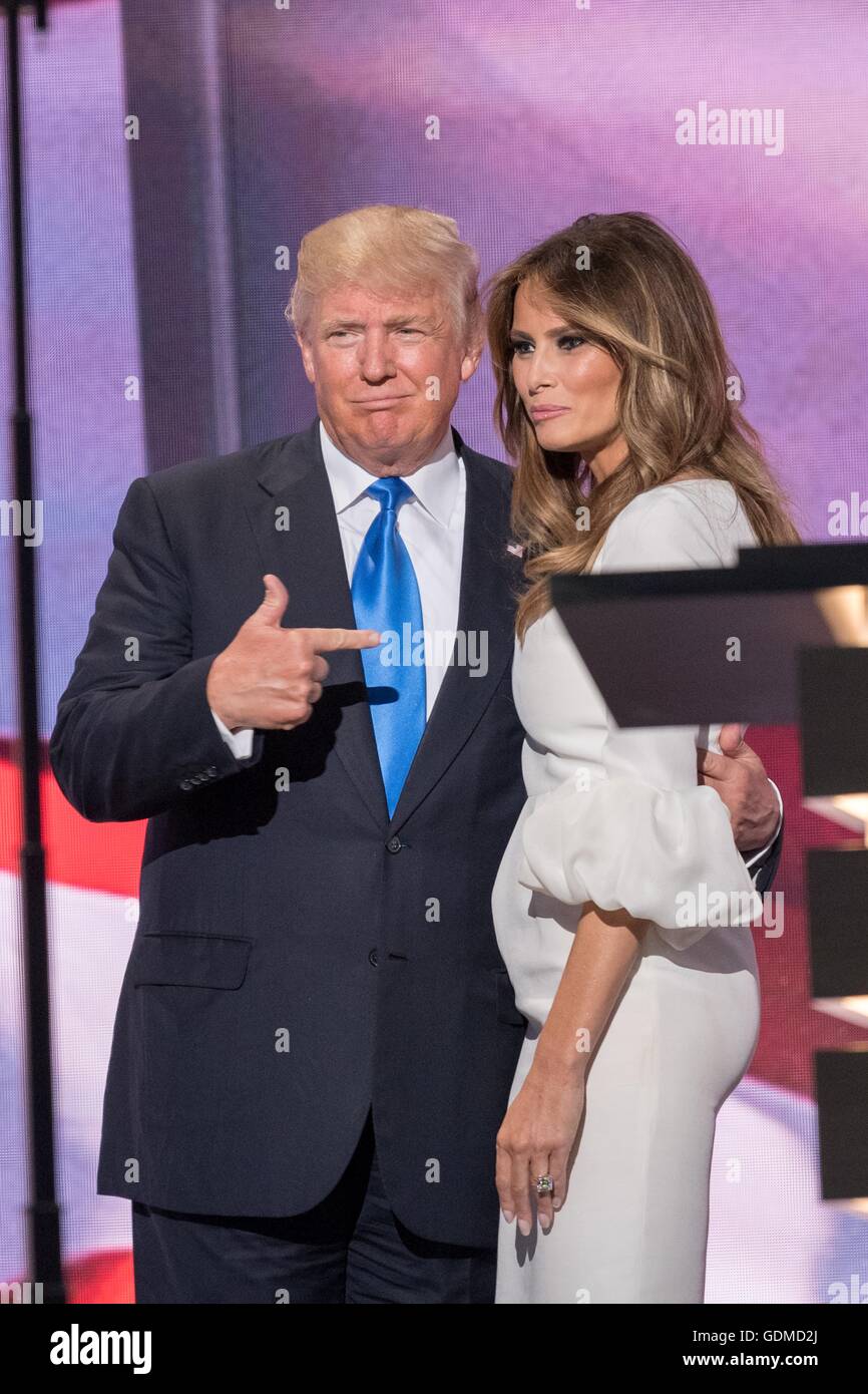 GOP presidential nominee Donald Trump points to his wife Melania Trump following her address during the first day of the Republican National Convention at the Quicken Loans Center July 18, 2016 in Cleveland, Ohio. Stock Photo