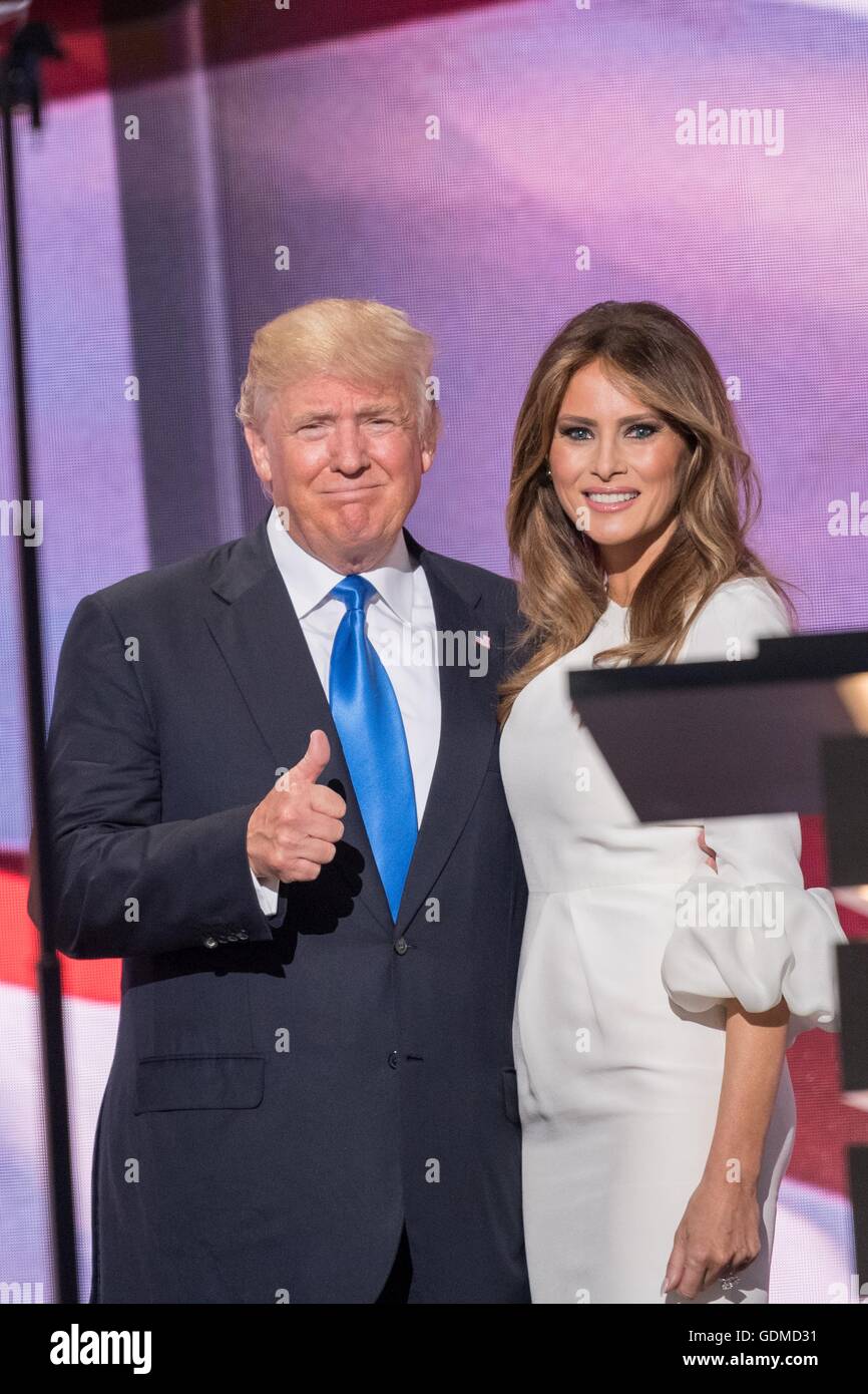 GOP presidential nominee Donald Trump gives a thumbs up to his wife Melania Trump following her address during the first day of the Republican National Convention at the Quicken Loans Center July 18, 2016 in Cleveland, Ohio. Stock Photo