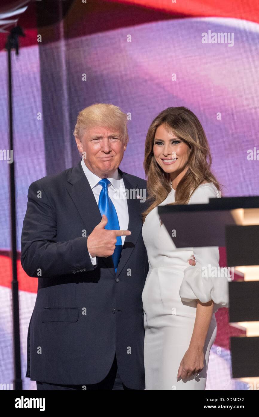 GOP presidential nominee Donald Trump points to his wife Melania Trump following her address during the first day of the Republican National Convention at the Quicken Loans Center July 18, 2016 in Cleveland, Ohio. Stock Photo