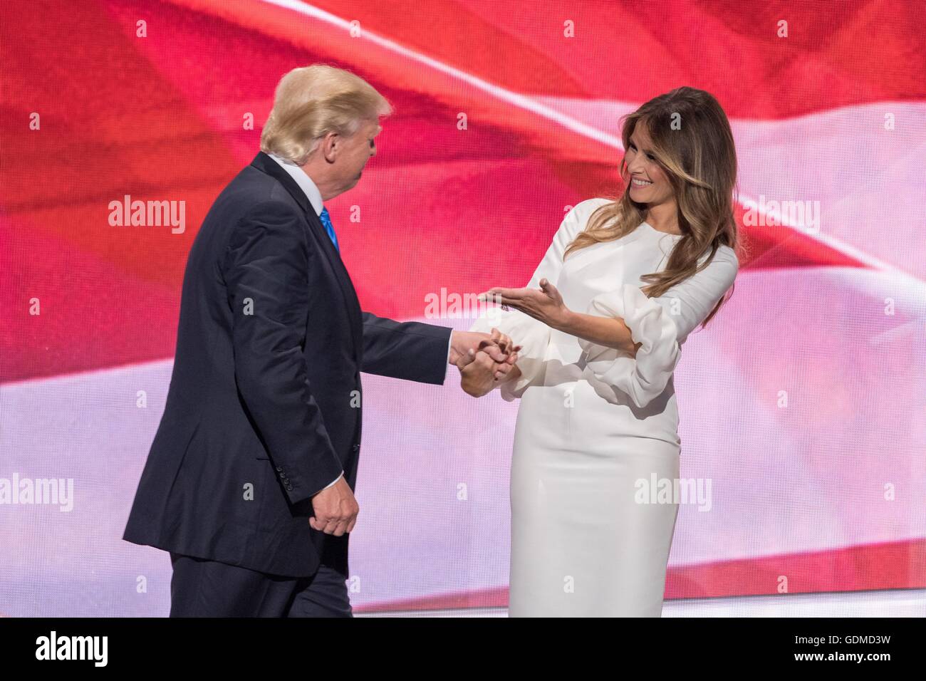 Melania Trump wife of GOP presidential nominee Donald Trump gestures to her husband in return following her address during the first day of the Republican National Convention at the Quicken Loans Center July 18, 2016 in Cleveland, Ohio. Stock Photo