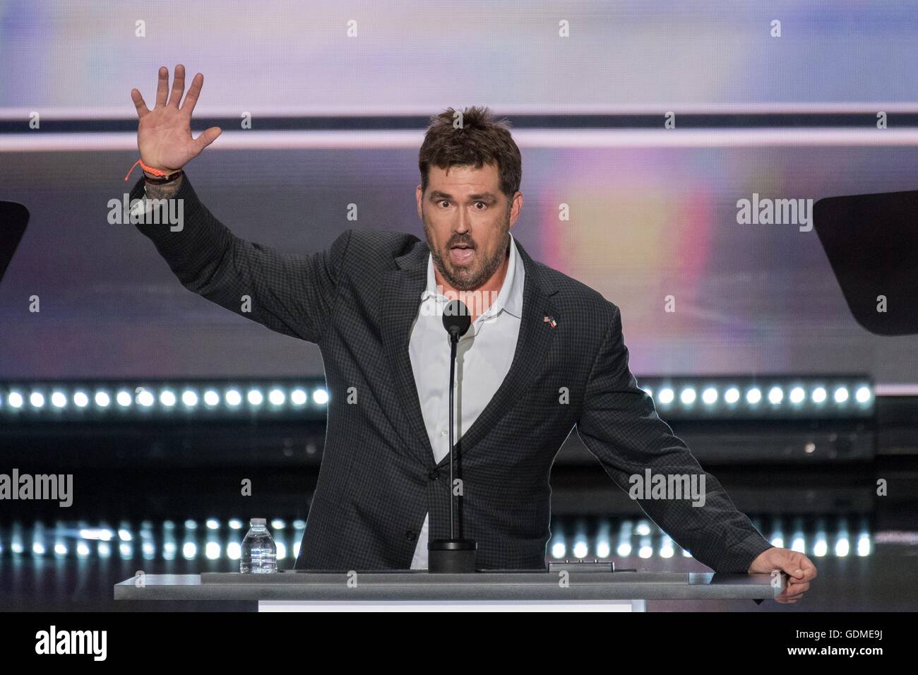 Retired Navy SEAL Marcus Luttrell addresses delegates during the first ...