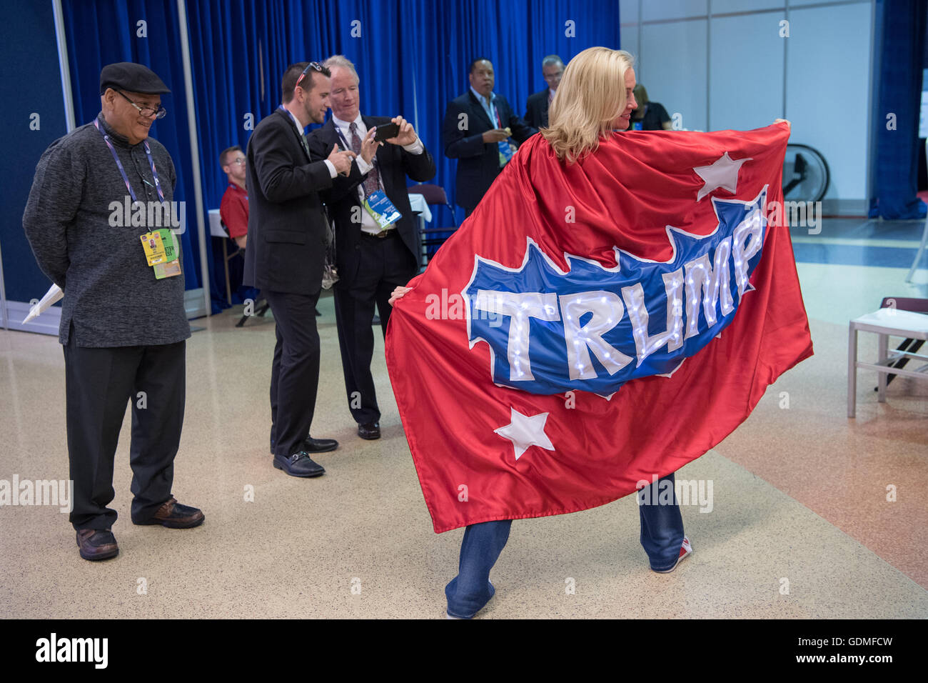 Cleveland, Ohio, USA . 19th July, 2016. A GOP delegate wears a Trump cape during the second day of the Republican National Convention July 19, 2016 in Cleveland, Ohio. Earlier in the day the delegates formally nominated Donald J. Trump for president. Credit:  Planetpix/Alamy Live News Stock Photo