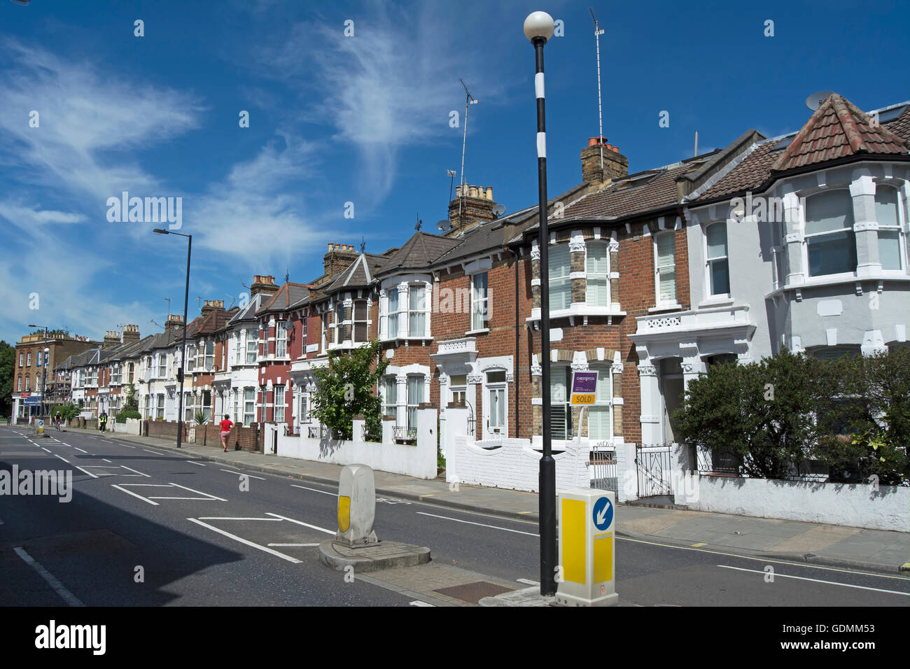 19th century terraced houses with bay windows in lillie road, fulham, london, england Stock Photo