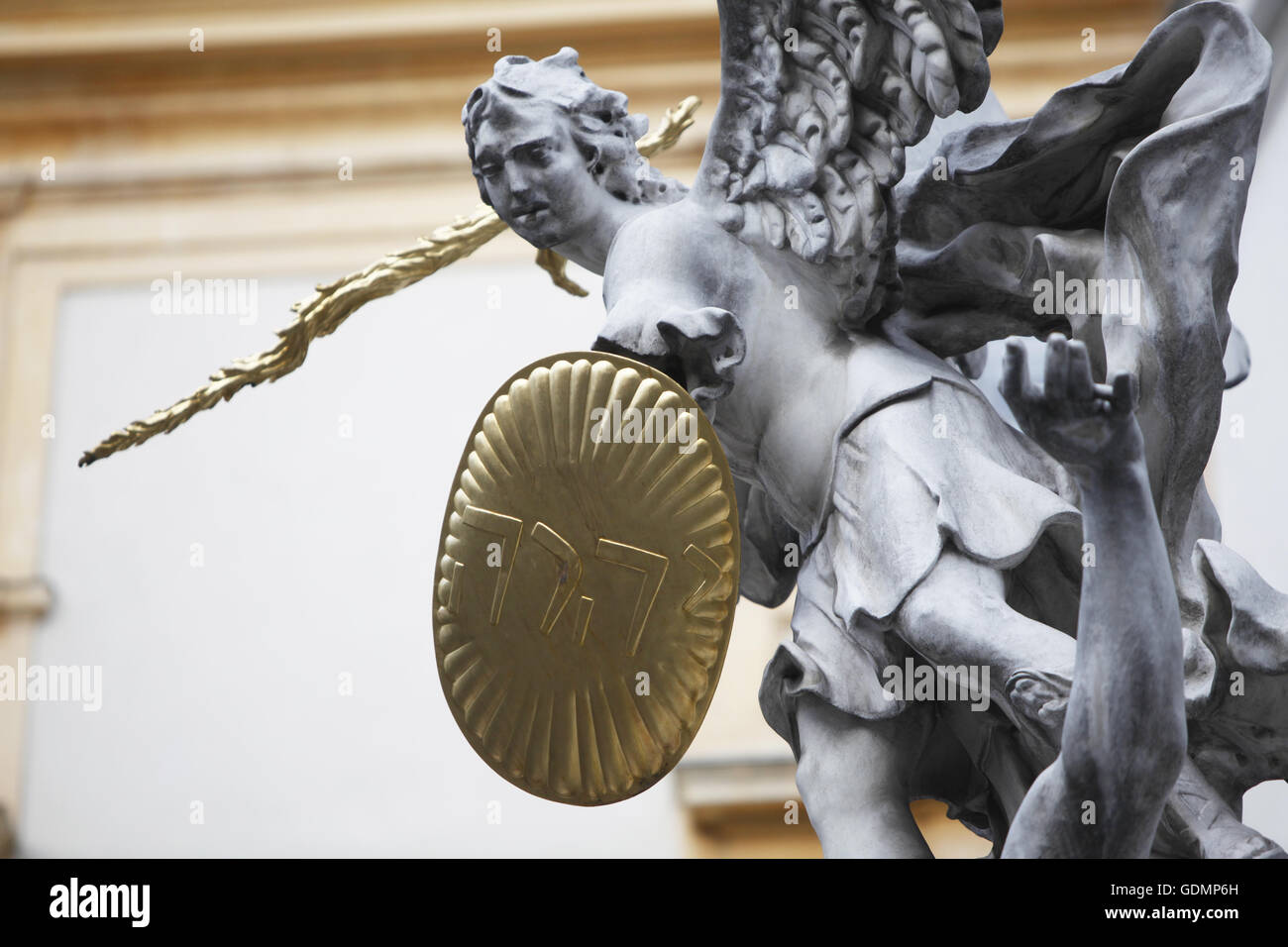 Statue of Saint Michael with gold shield and sword in center of Vienna ...