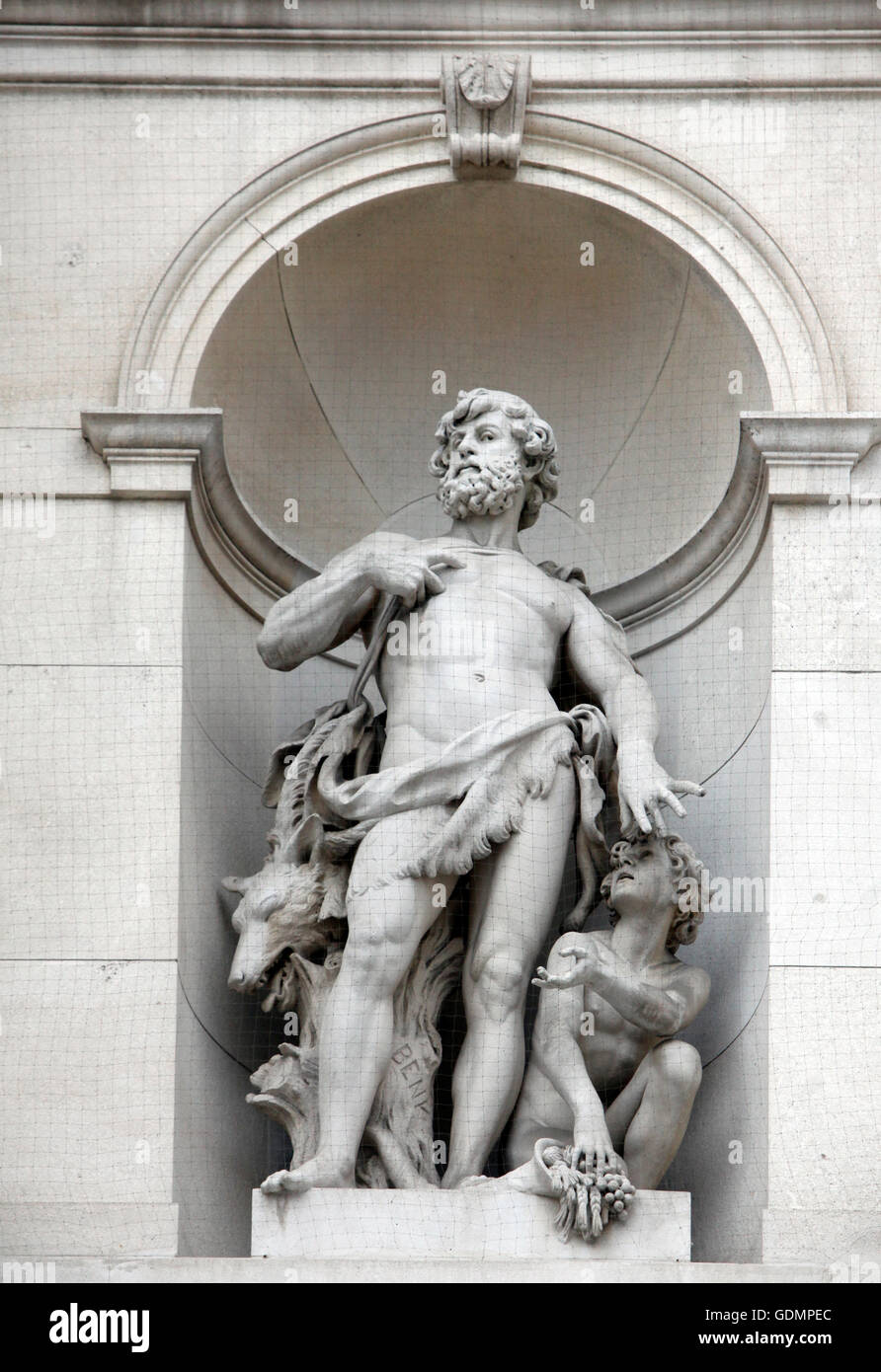 Burgtheater, Vienna, statue shows an allegory of egoism Stock Photo