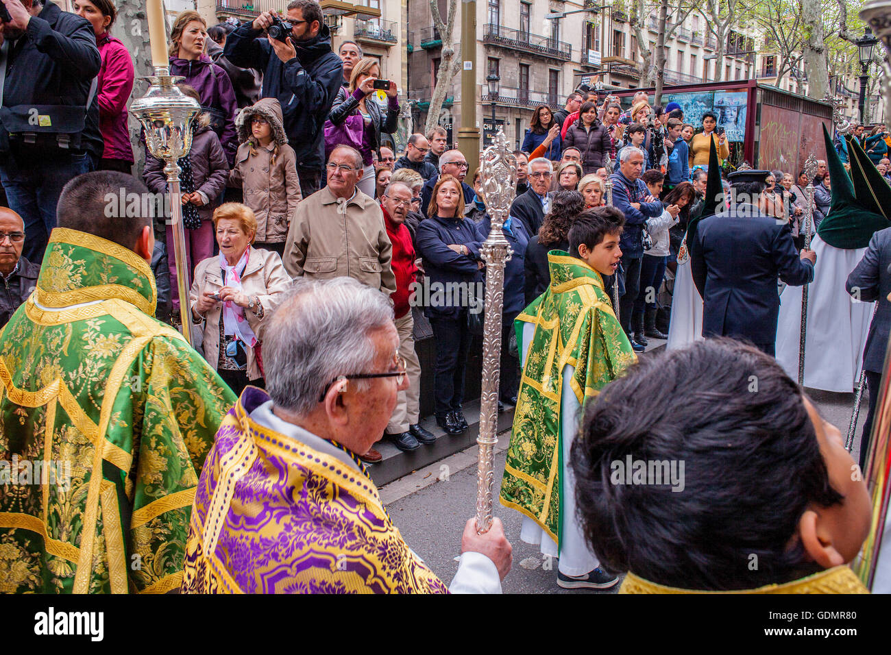 priest and altar servers in procession, sisterhood of JesÃƒÂºs del Gran Poder y virgen de la Macarena,Good Friday, Easter week,L Stock Photo