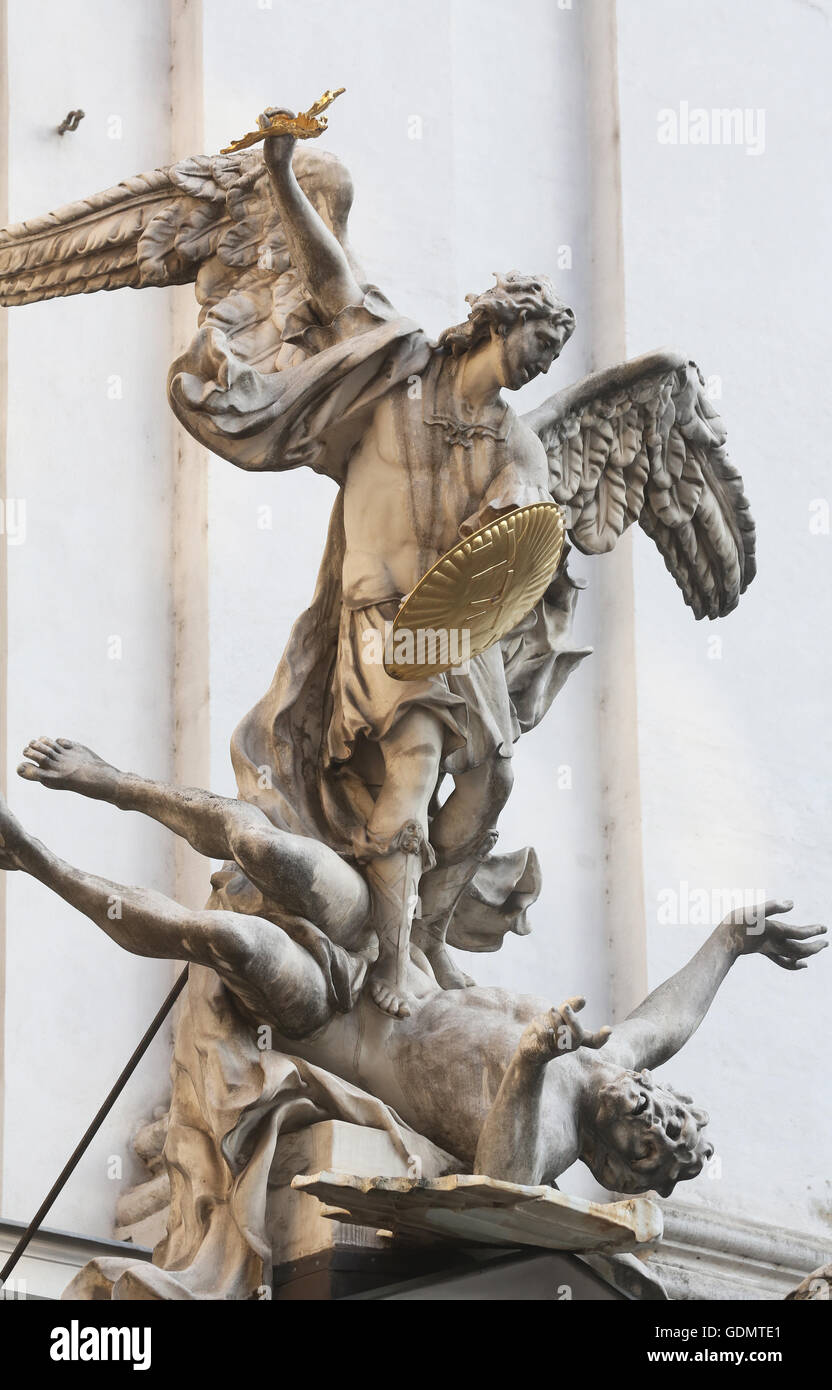 Statue of Saint Michael with gold shield and sword in center of Vienna ...