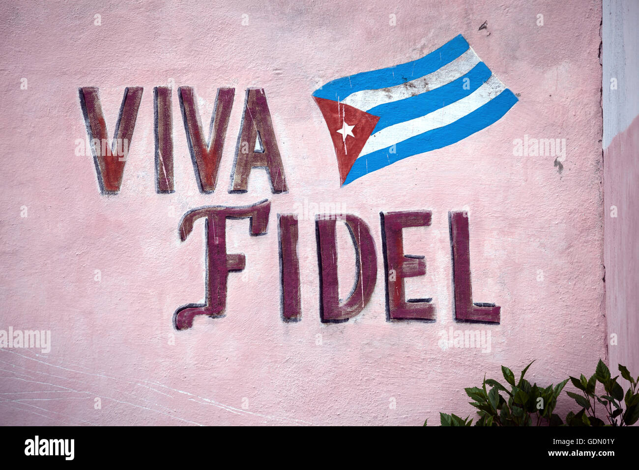 Painted wall with the flag of Cuba and the words Viva Fidel, Santiago of Cuba, Santiago de Cuba Province, Cuba Stock Photo