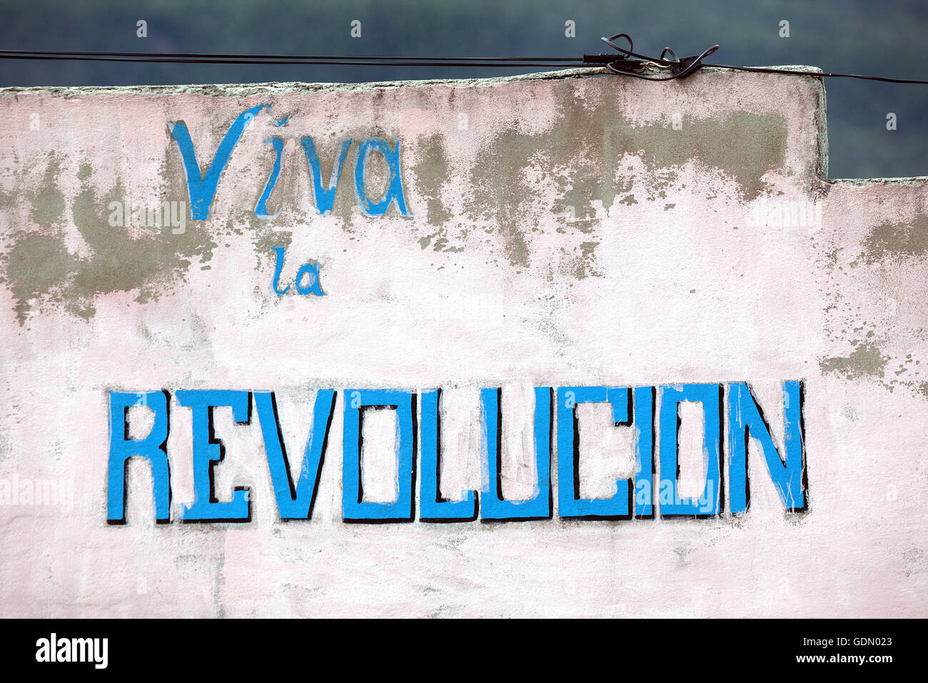 Painted wall with the words Viva la Revolucion in Santiago of Cuba, Santiago de Cuba Province, Cuba Stock Photo