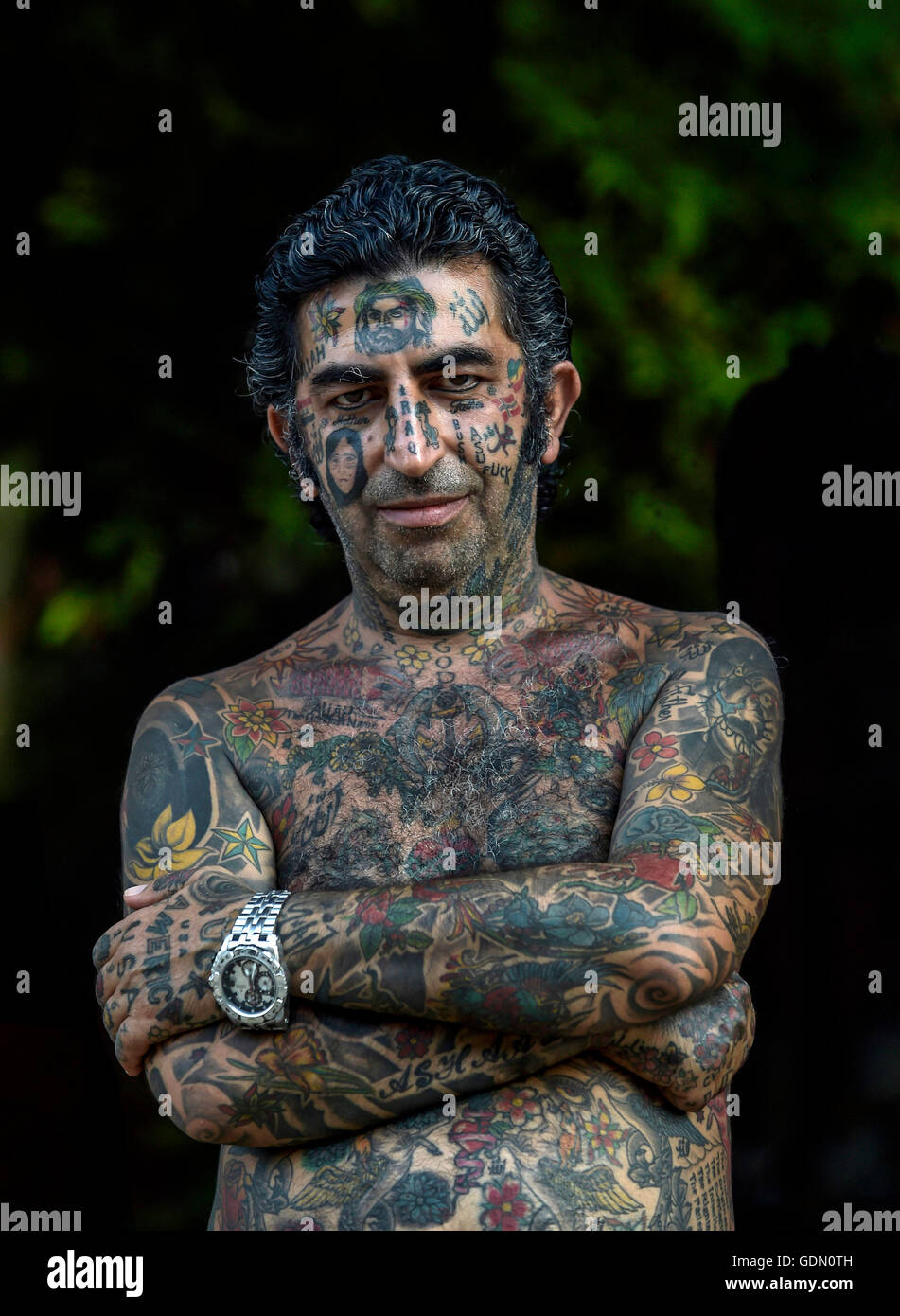 Man, Arab with tattoos all over his body, Ko Samui, Thailand Stock Photo