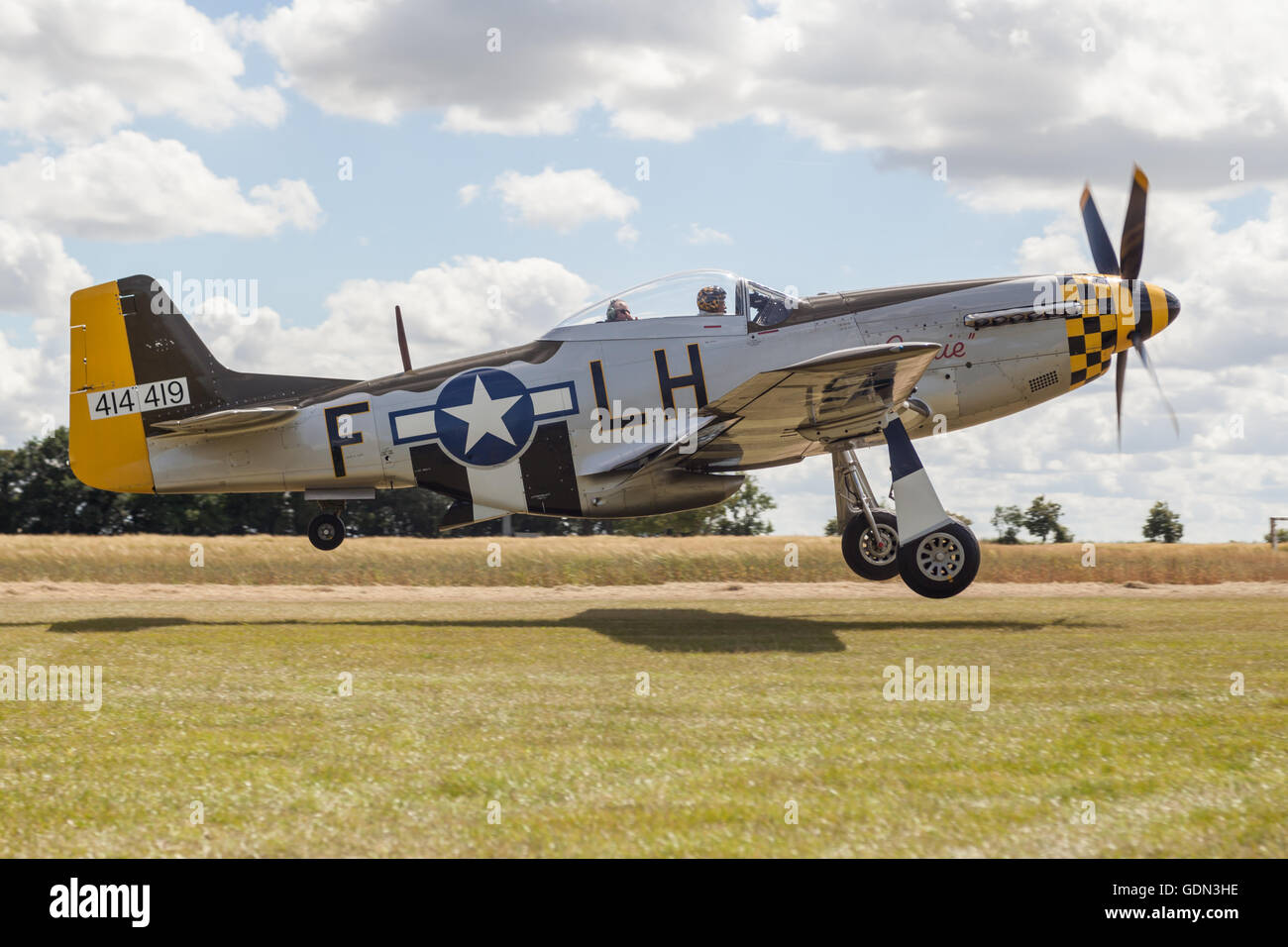 Restored airworthy P-51D Mustang American fighter aeroplane taking off at the hardwick warbirds janie which has since been wrecked in a crash Stock Photo