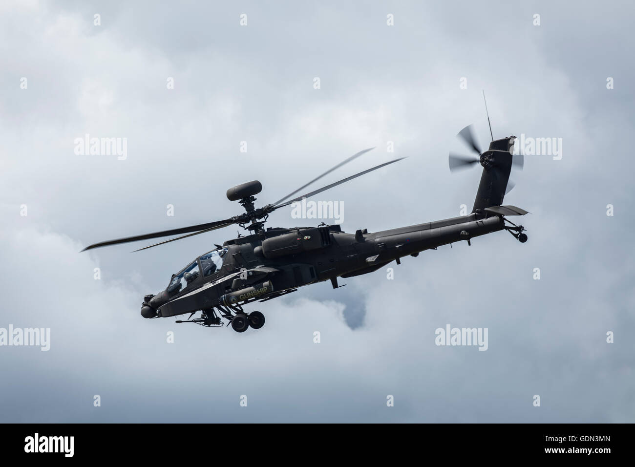 British Army Apache Helicopter in the sky Stock Photo