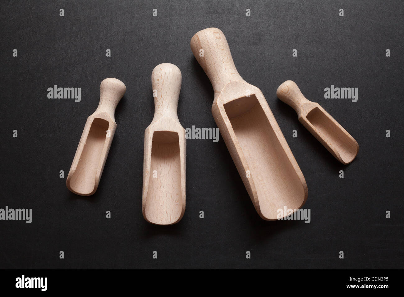 Wooden scoops - bailer isolated on a black background Stock Photo