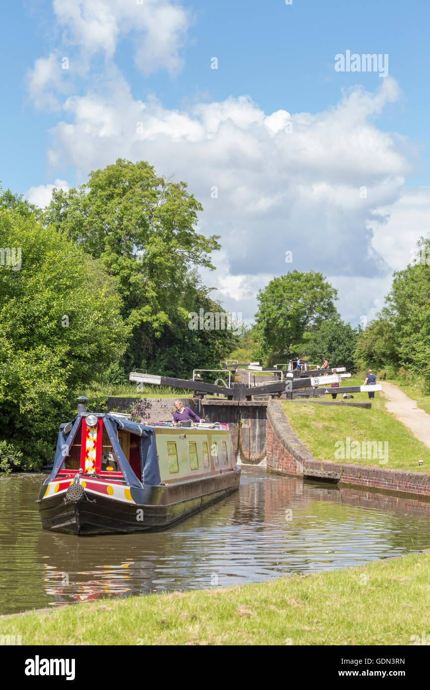 Boating on the Stratford upon Avon canal near Lapworth, Warwickshire, England, UK Stock Photo