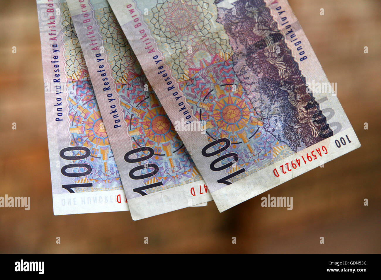 100 Rand notes on the washing line, South Africa Stock Photo
