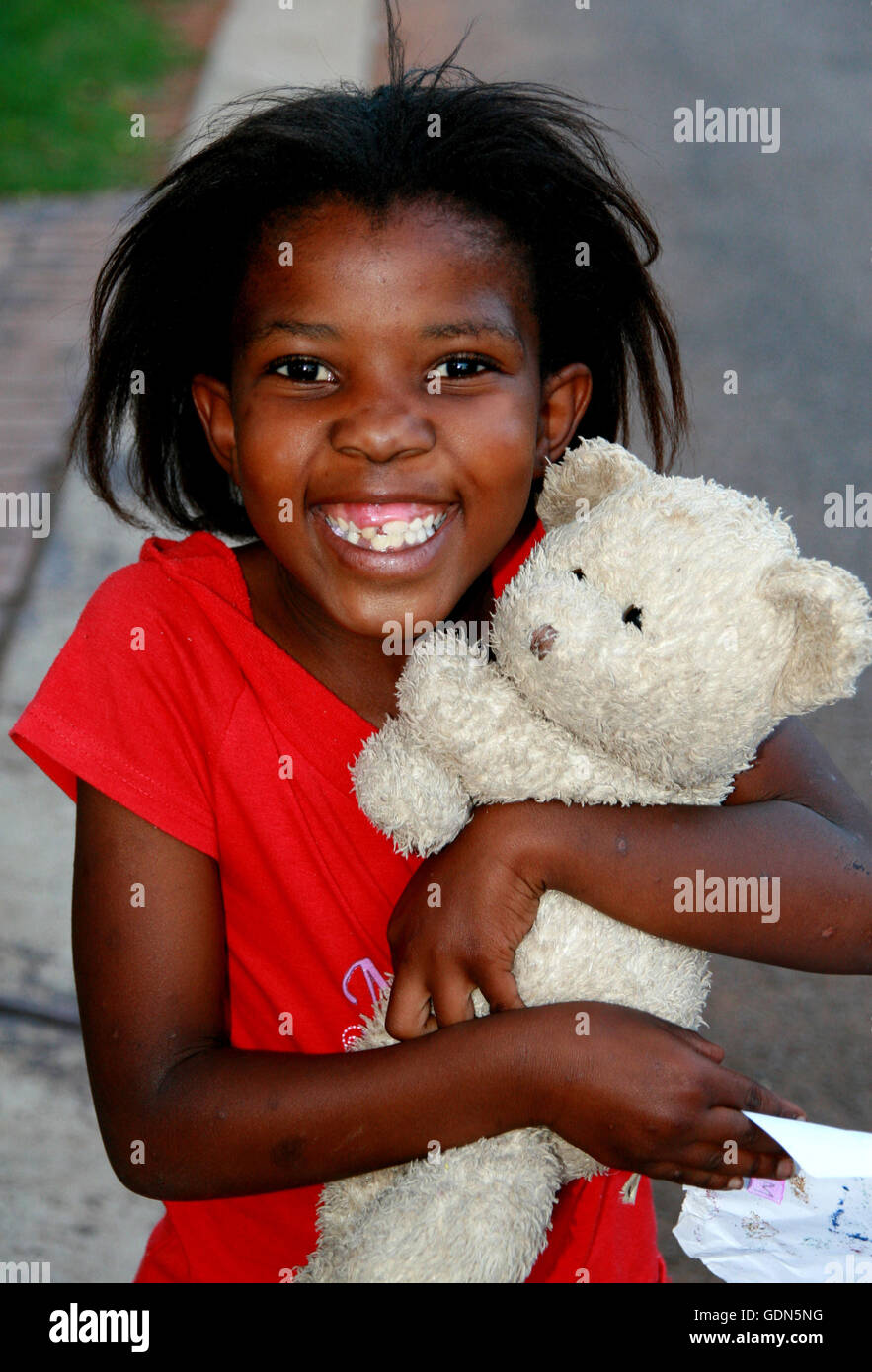 African girl with teddy bear, South Africa Stock Photo Alamy