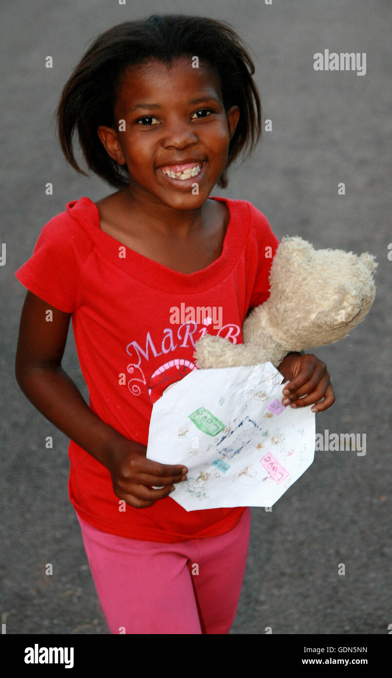 African girl with teddy bear, South Africa Stock Photo - Alamy