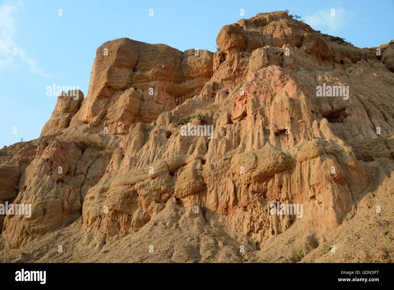 Heavily eroded, weathered soft sandstone / conglomerate cliffs, near Foca, Bosnia and Herzegovina, July. Stock Photo