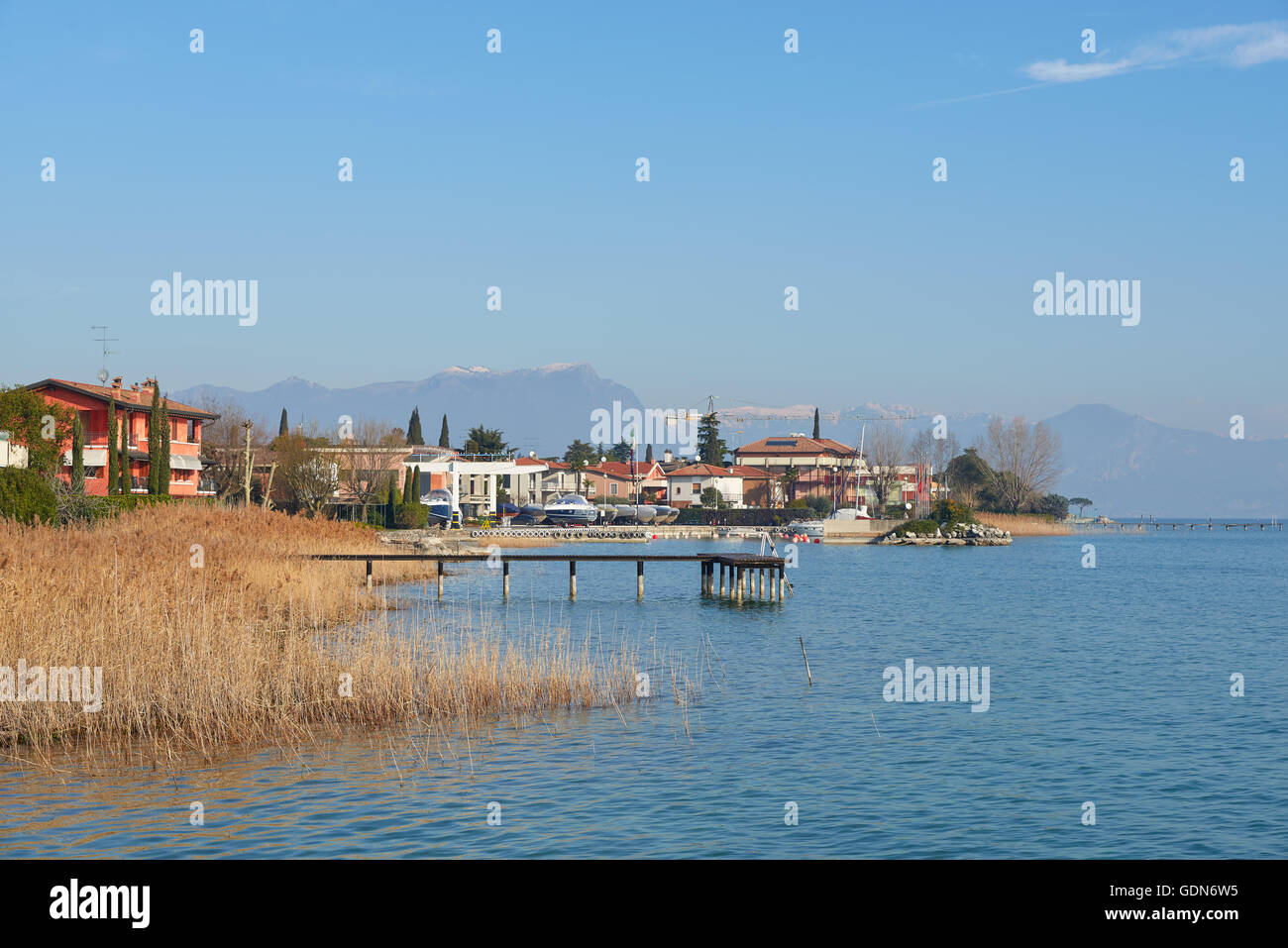 landscape of coastline of Sirmione in a winter. Sirmione is a famous vacation place in the northern Italy. Stock Photo