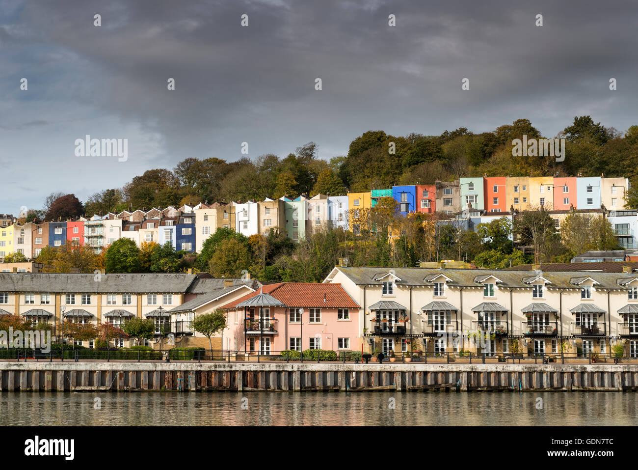 View of colourful terraced houses from Baltic Wharf Marina across Floating Harbour, Bristol, UK