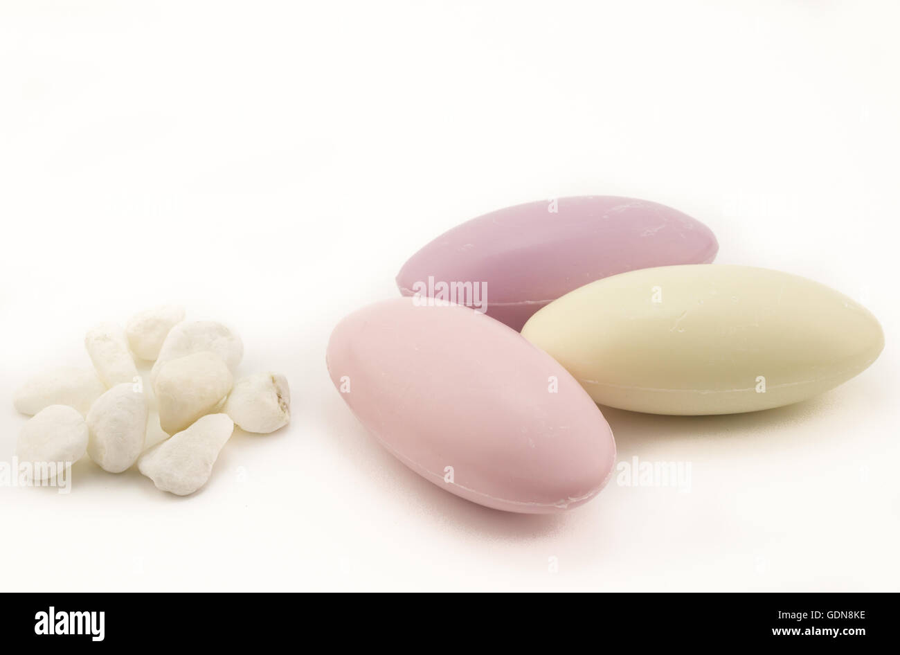French fragrant pebble soaps isolated on white background Stock Photo