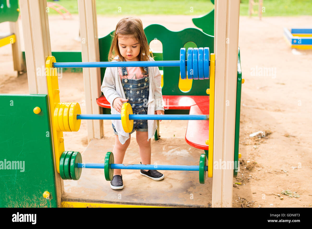 cute little girl on a playground Stock Photo - Alamy