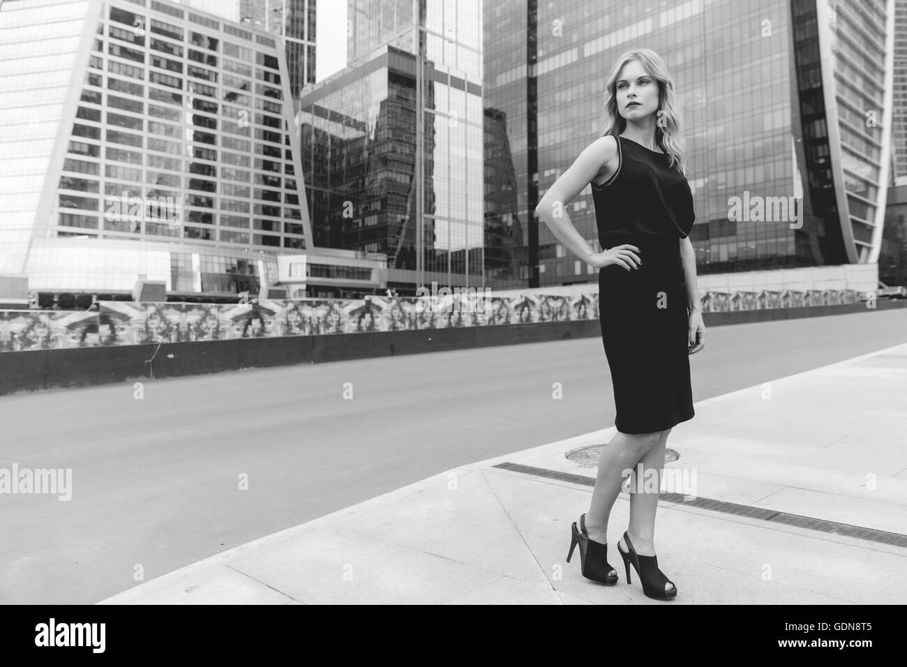 Black and white portrait of business woman in full growth Stock Photo