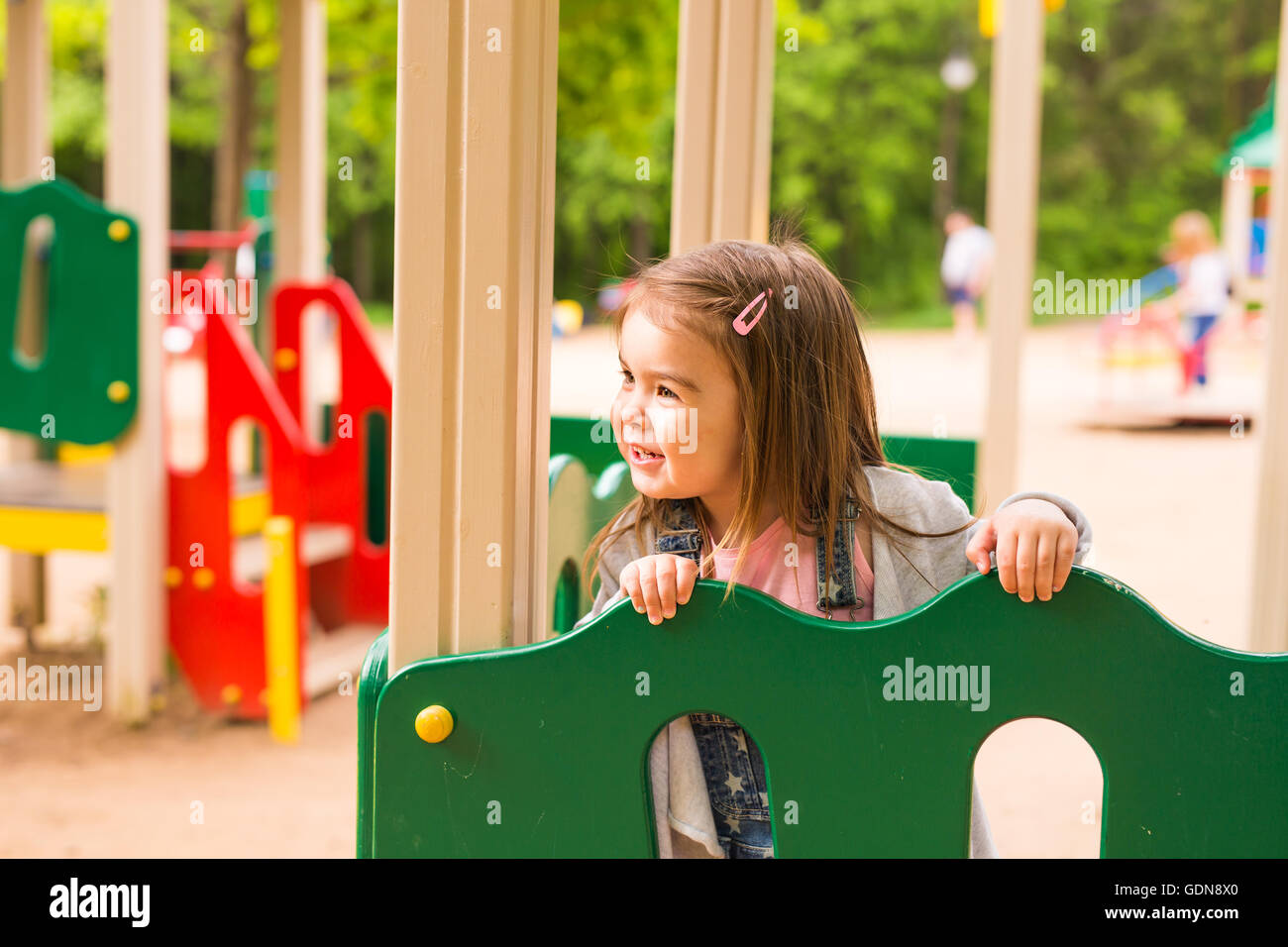 cute little girl on a playground Stock Photo - Alamy