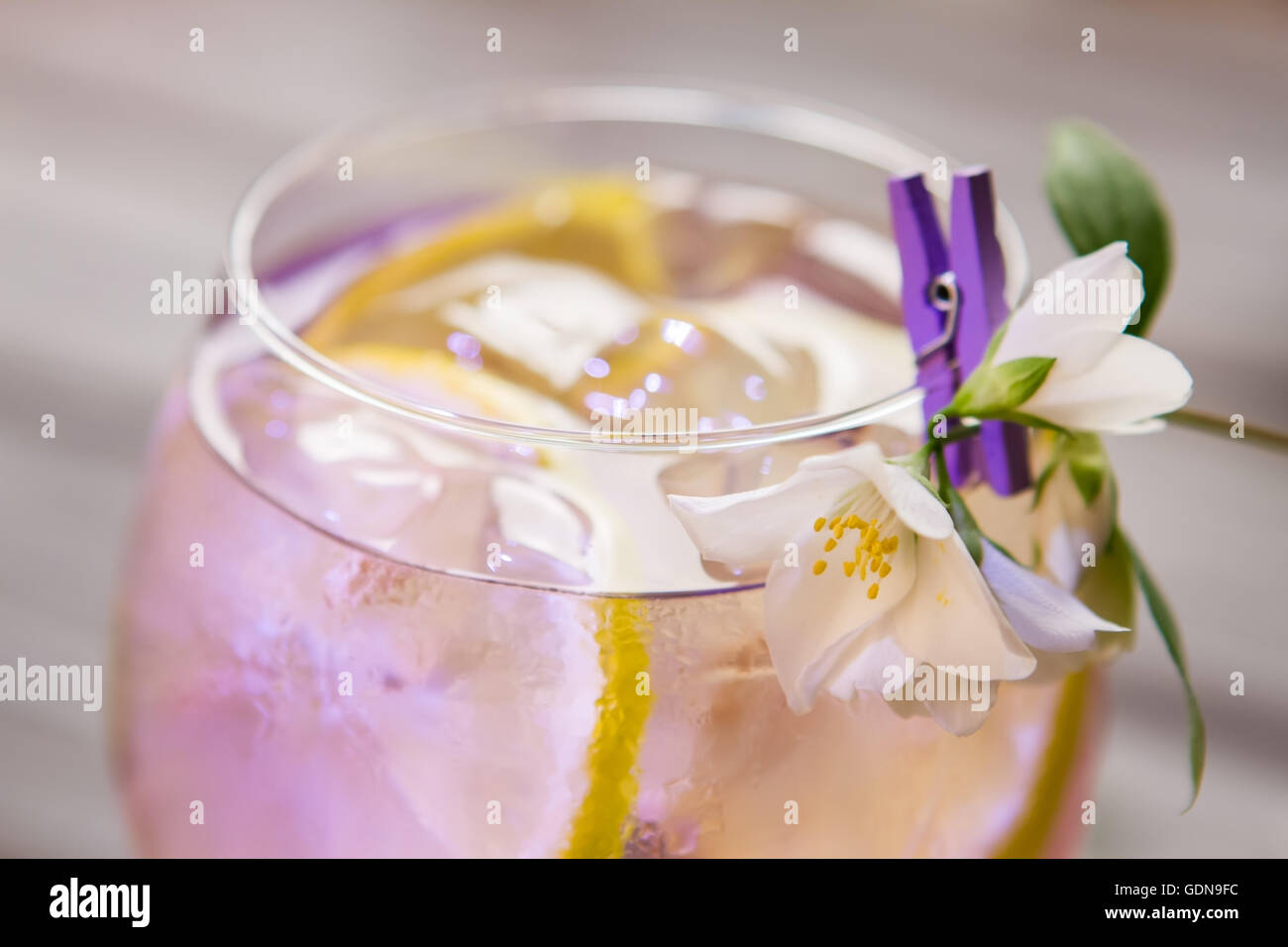Cocktail decorated with white flower. Stock Photo