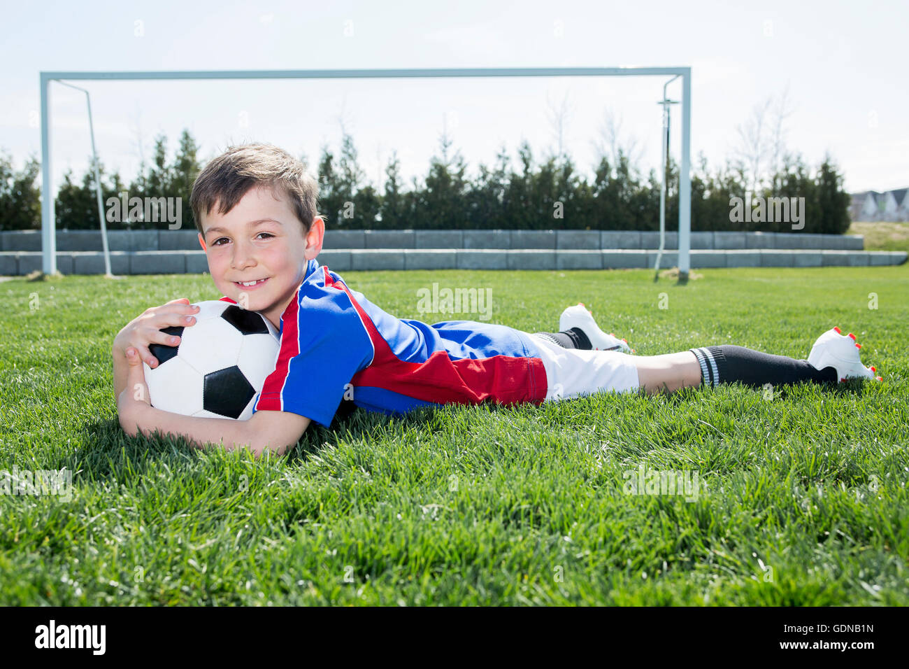 handsome teenager boy Football Stock Photo - Alamy