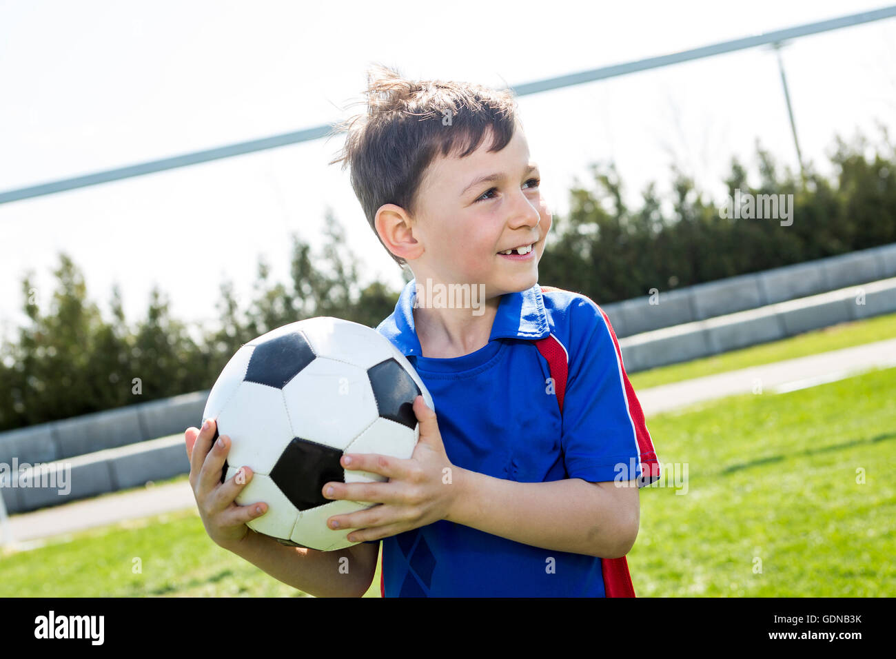 handsome teenager boy Football Stock Photo