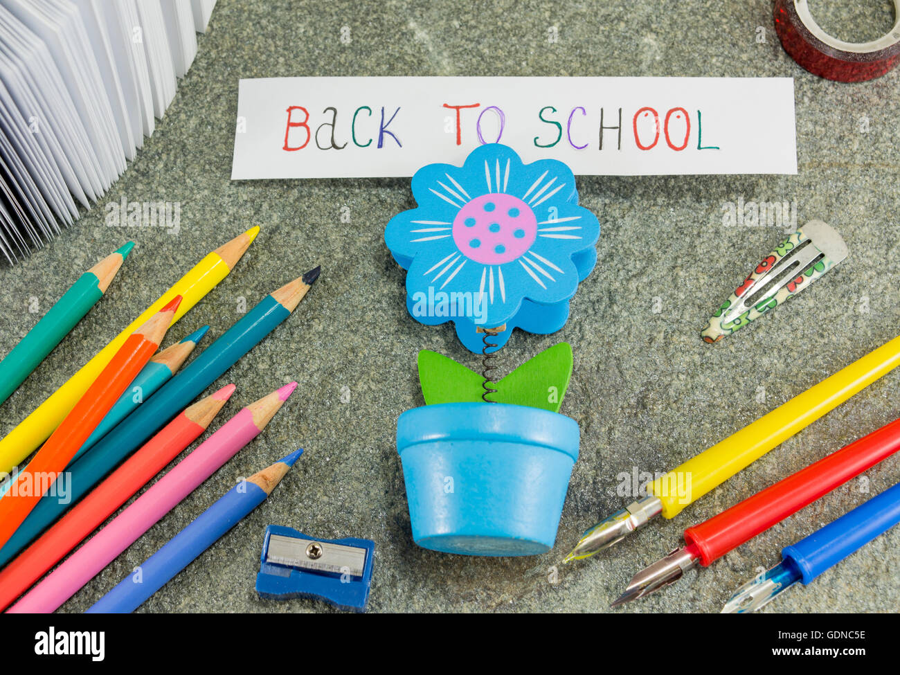 Back to school note held by a paper holder Stock Photo