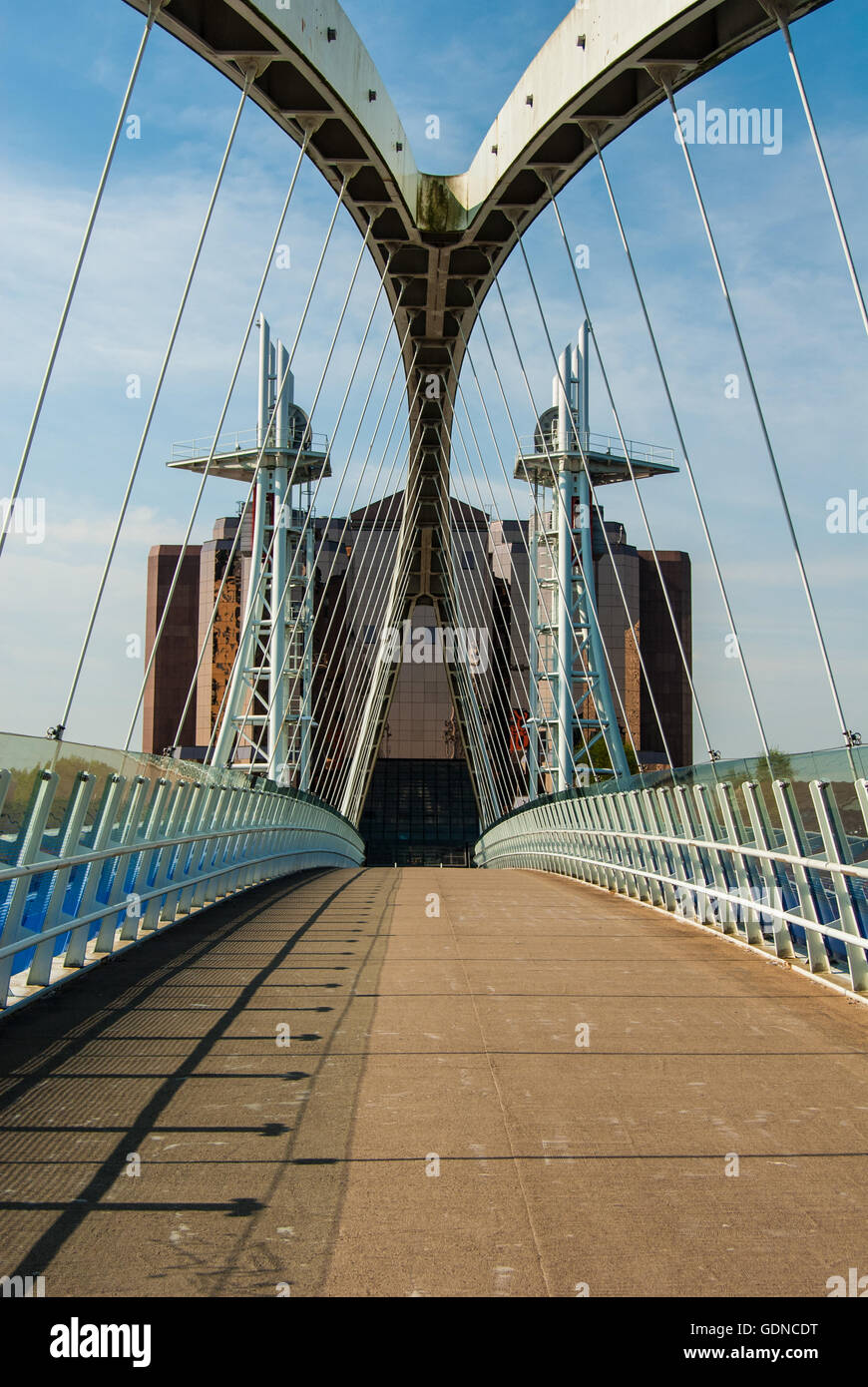 Salford Quays - Footbridge leading from The Lowry, arts centre towards Quay West on the Waterfront. Stock Photo