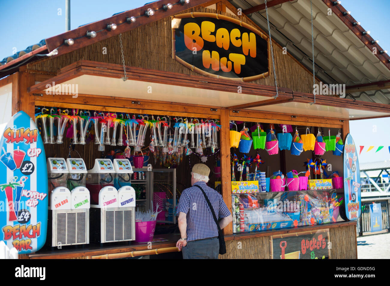 A temporary beach hut stall set up at the Liverpool pier head during summer heatwave 2016 uk Stock Photo