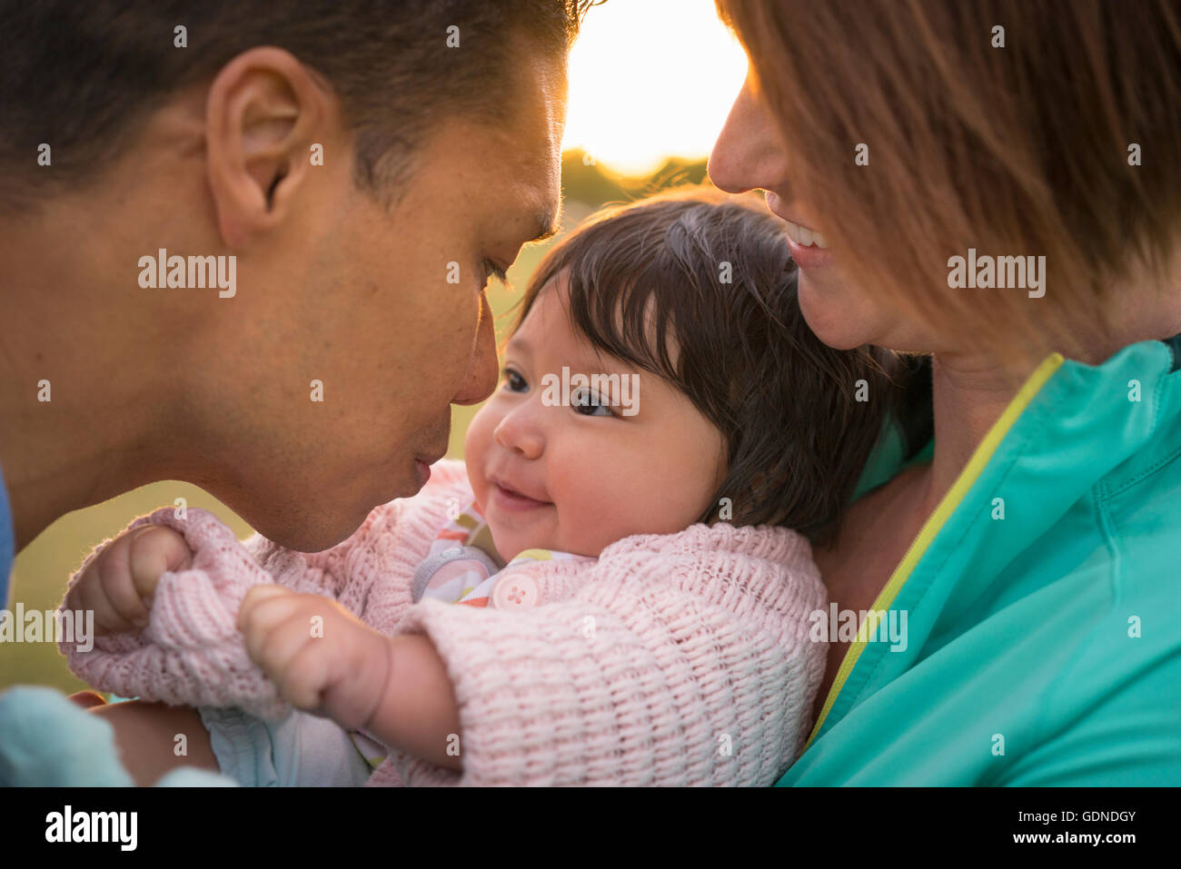 Close up of couple with baby Stock Photo
