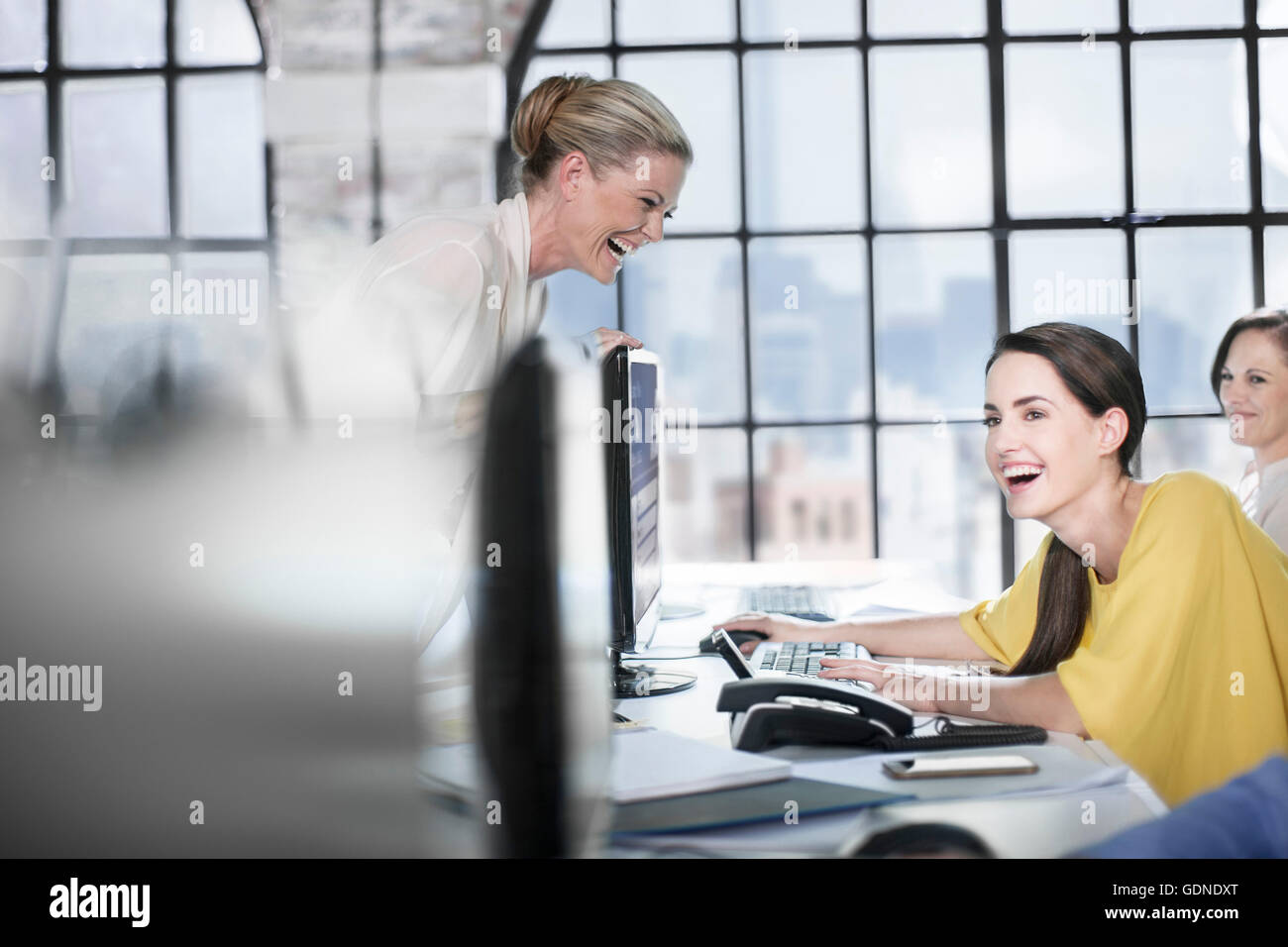 Laughing At A Call Center Employees