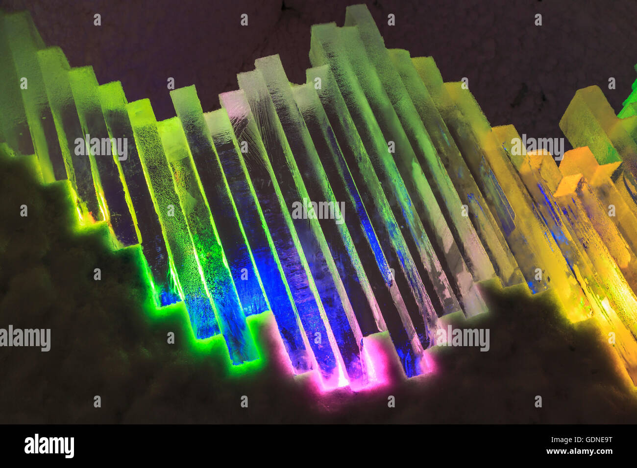 Stack of ice blocks lit with colourful lights near Fairbanks, Alaska Stock Photo