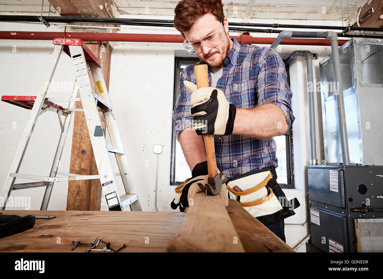 Man working up ladder using hi-res stock photography and images - Alamy