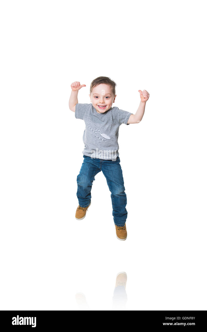 Little boy jumping in the air Stock Photo
